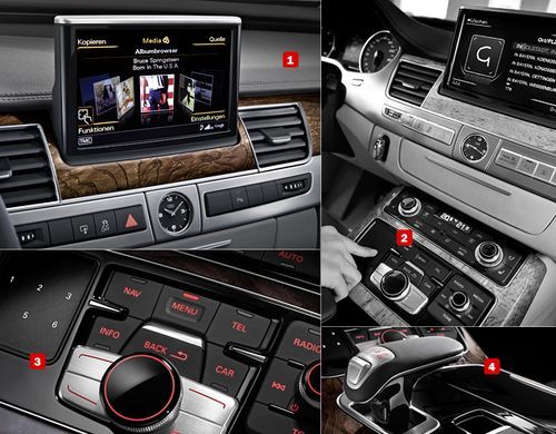 У мультимедийного комплекса MMI с собственной графической подсистемой на базе чипа NVIDIA новый интерфейс, напоминающий продукцию компании Apple. Музыкальные альбомы, хранящиеся на жестком диске развлекательной системы, например, теперь отображаются в виде прокручивающейся ленты. MMI touch - отдельный "тач-пад", размещенный слева от джойстика MMI. При помощи этой сенсорной панели можно управлять навигацией, вводить адрес пункта назначения (система распознает русские рукописные символы), выбирать станцию радиоприемника и так далее. Как работает эта система - смотрите в нашем видеоролике в конце статьи.  Быстрый доступ к основным функциям системы MMI обеспечивают клавиши с соответствующими названиями. NAV заведует навигацией, INFO - бортовыми системами, TEL - телефоном, CAR - настройками адаптивной подвески и шасси, а MENU - это переход в главное меню.  Широкий селектор АКПП служит не только для управления коробкой передач - это еще и удобная подставка под руку для манипуляций с джойстиком MMI или "тач-падом"